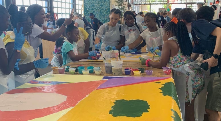 Hundreds turn out to add color to Philadelphia Foundation legacy mural