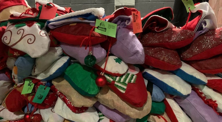Officers swap police uniform for Santa hats, donate dozens of bikes to kids 3